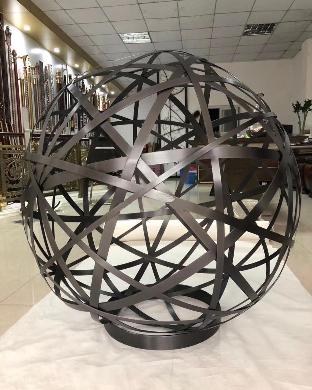 Asuncion--Custom stainless steel ball with black hairline plate finish